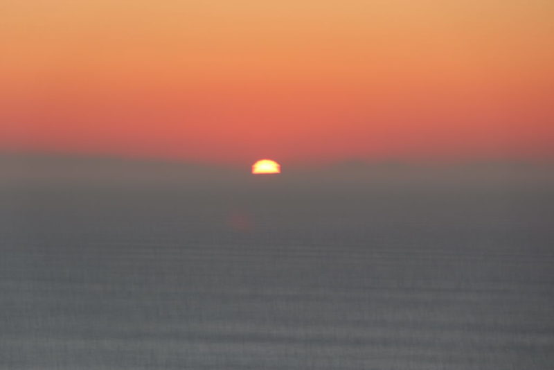 Die Sonne versinkt im Meer bei Slieve League, wenige MInuten später